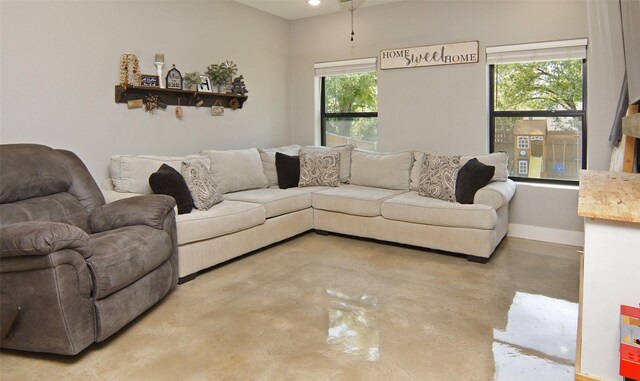 living room featuring concrete floors