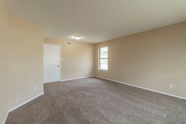 spare room with carpet