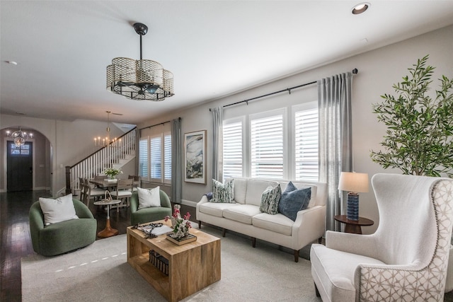 living room featuring a chandelier