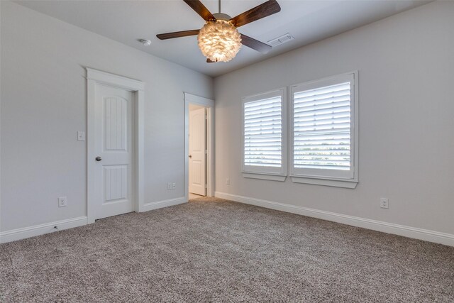 unfurnished bedroom with carpet flooring and ceiling fan