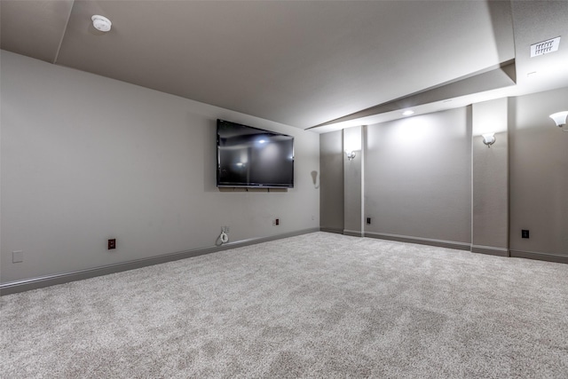 basement featuring carpet flooring