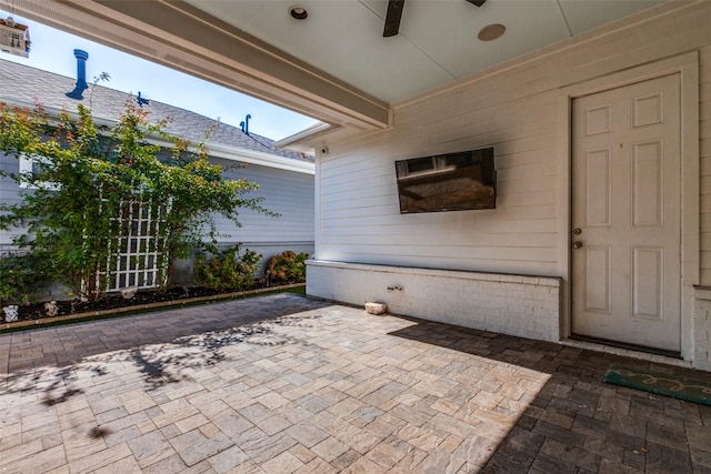 view of patio with ceiling fan