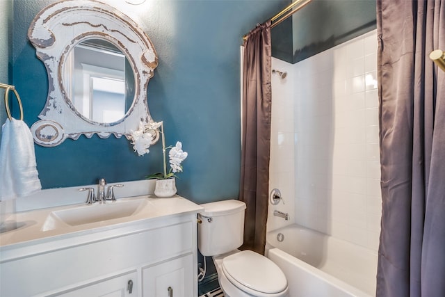 full bathroom featuring vanity, shower / tub combo, and toilet