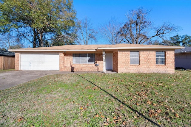 ranch-style house with a garage and a front yard