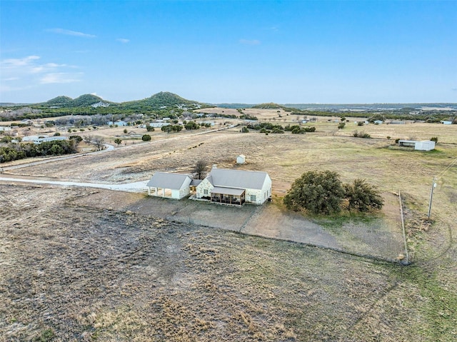 bird's eye view with a mountain view and a rural view