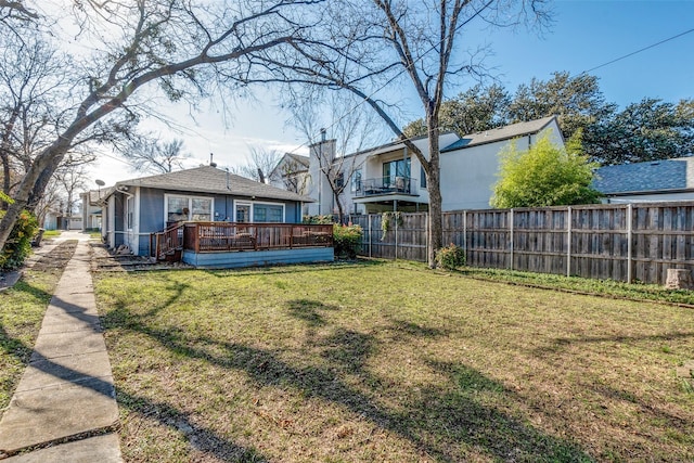 view of yard with a deck