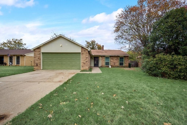 single story home with a garage and a front lawn