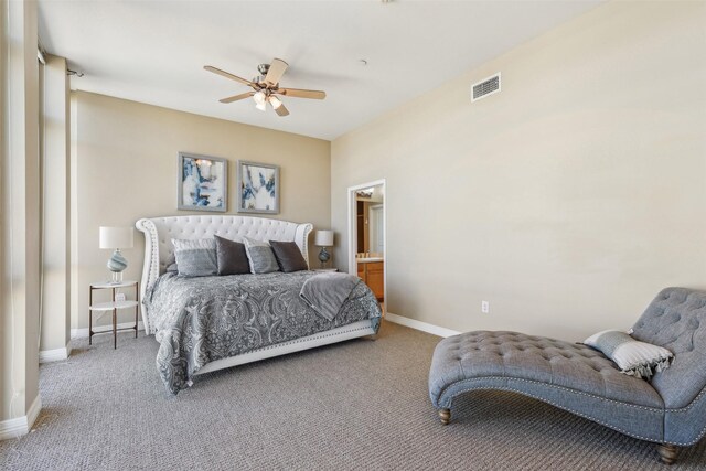 bedroom featuring carpet flooring, ceiling fan, and ensuite bathroom