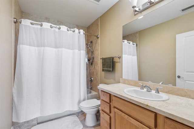 full bathroom featuring vanity, toilet, and shower / tub combo with curtain