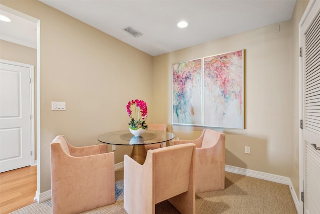 dining room featuring light wood-type flooring