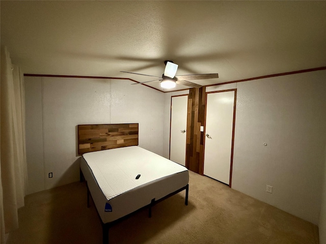 bedroom featuring carpet and ceiling fan