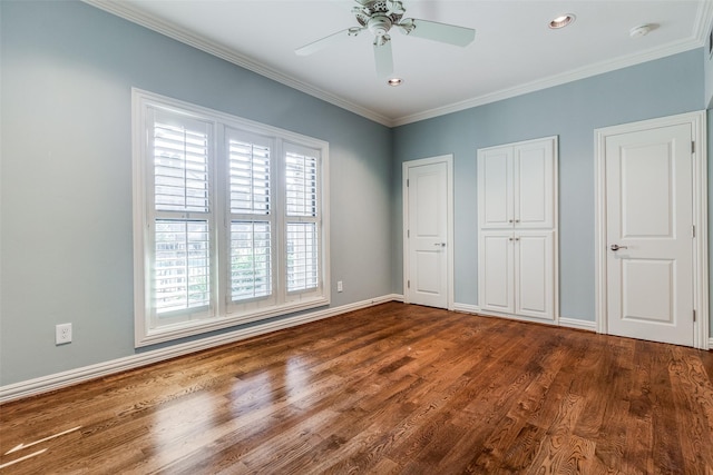 unfurnished bedroom featuring hardwood / wood-style flooring, ceiling fan, and ornamental molding