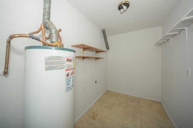 utility room with gas water heater