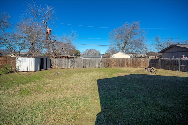 view of yard with a storage shed