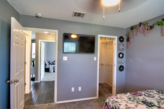 carpeted bedroom with ceiling fan