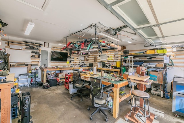 garage with a workshop area