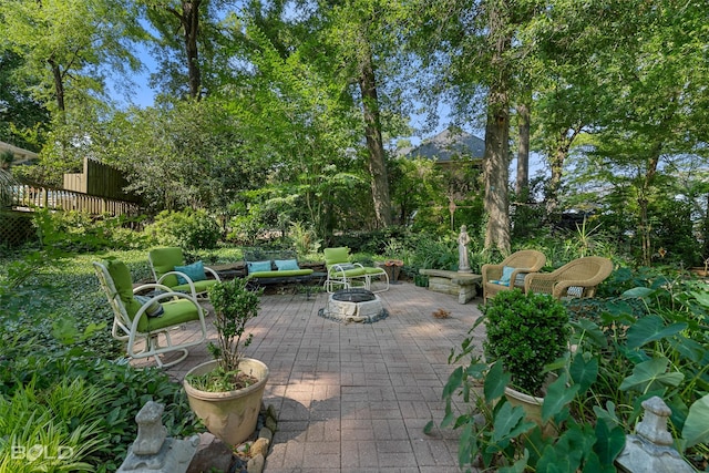 view of patio featuring an outdoor hangout area and a mountain view