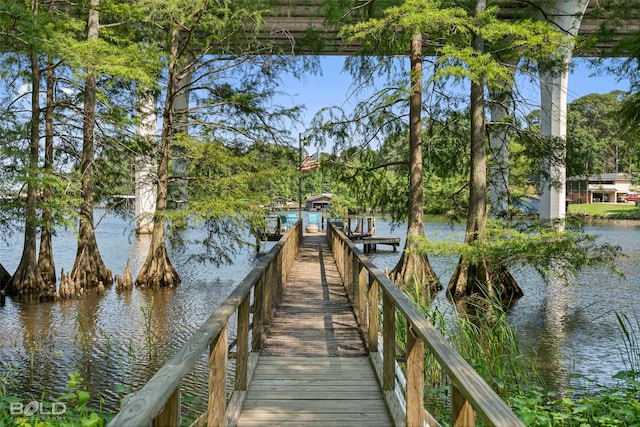 view of dock with a water view