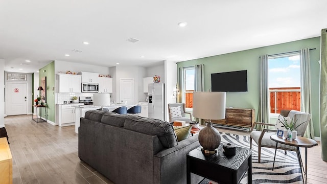 living room featuring light wood-type flooring