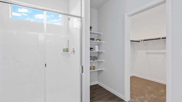 bathroom featuring an enclosed shower