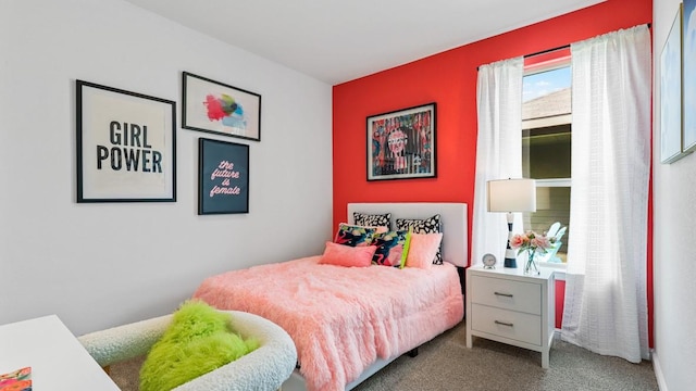 bedroom featuring carpet