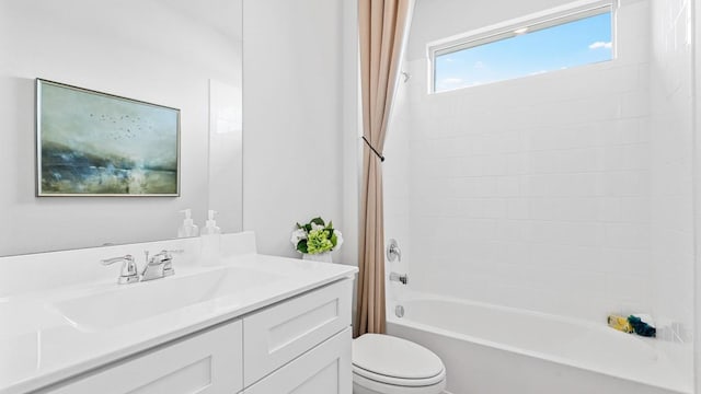 full bathroom featuring shower / bath combo, toilet, and vanity