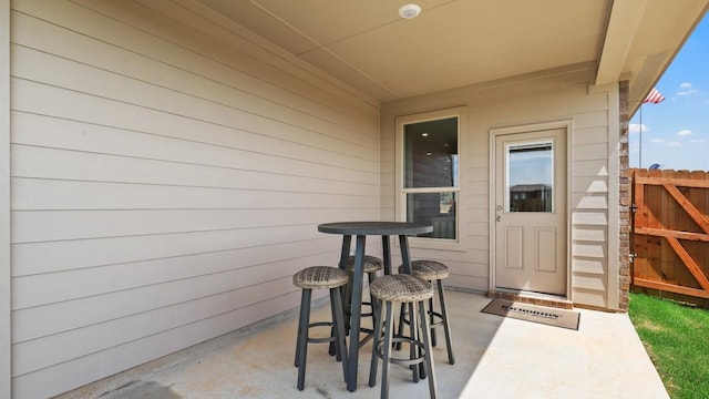 entrance to property featuring a patio area