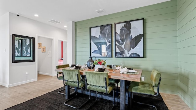 dining area featuring light wood-type flooring