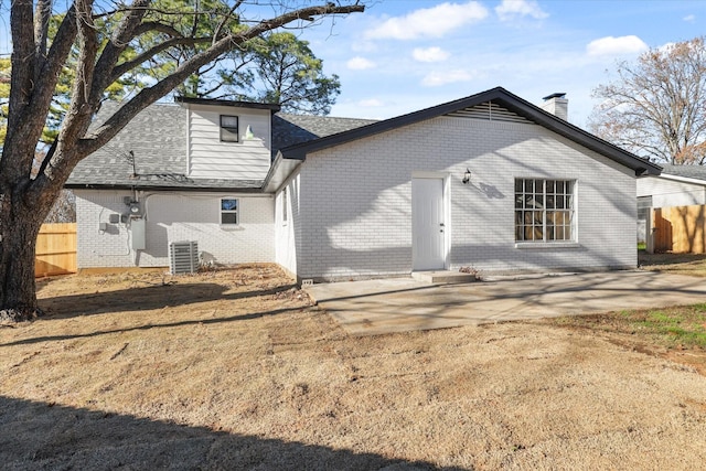 back of house featuring a patio and cooling unit