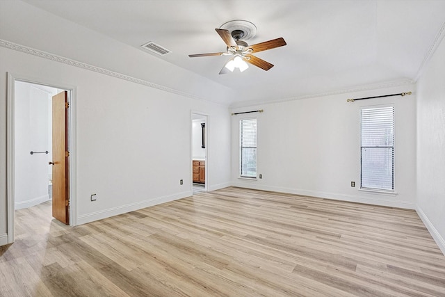 empty room with ornamental molding, light hardwood / wood-style floors, and ceiling fan