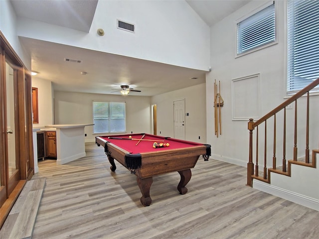 2735 Steamboat Cir, Arlington, TX 76006 - recreation room featuring light wood finished floors, baseboards, pool table, a towering ceiling, and a ceiling fan