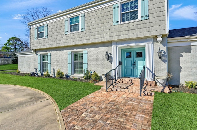 view of front of home featuring a front yard