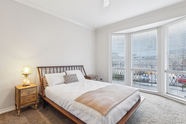 bedroom with access to exterior, ceiling fan, crown molding, and dark colored carpet