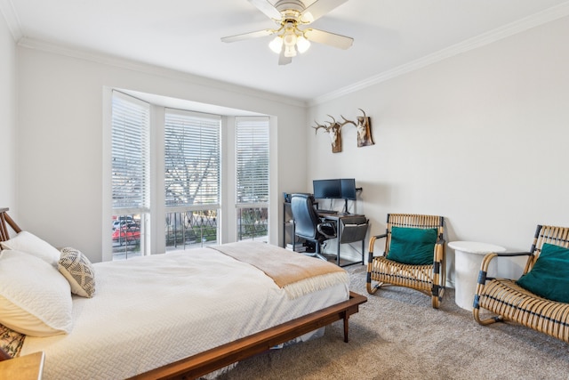 bedroom with carpet, ceiling fan, and crown molding