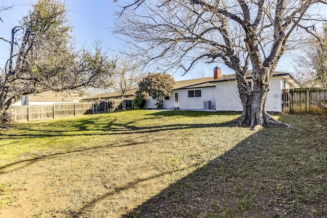 view of yard with central AC