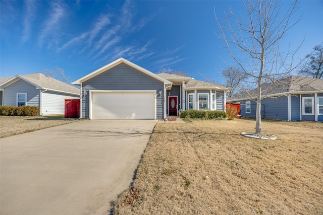 ranch-style house featuring a garage