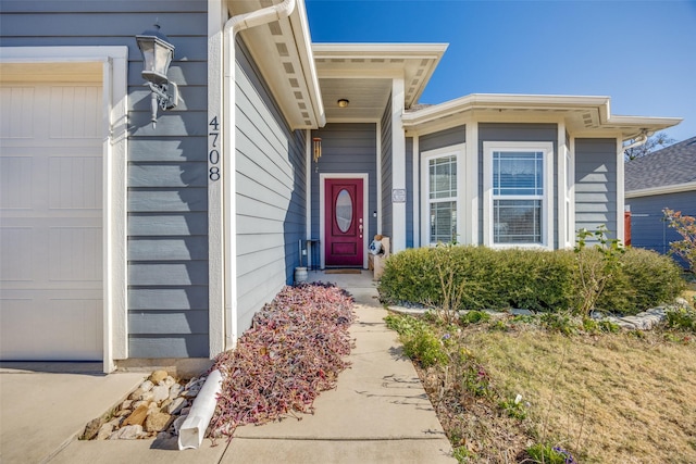 property entrance featuring a garage