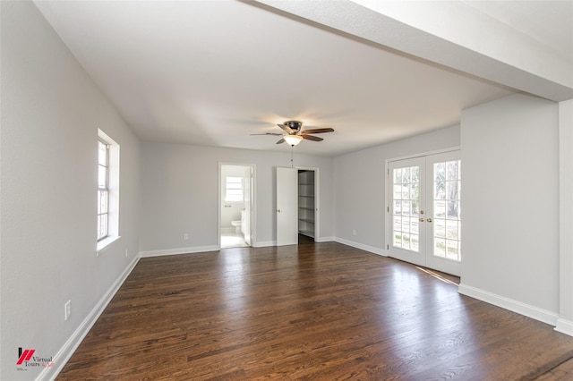 unfurnished room featuring dark hardwood / wood-style flooring, a wealth of natural light, french doors, and ceiling fan