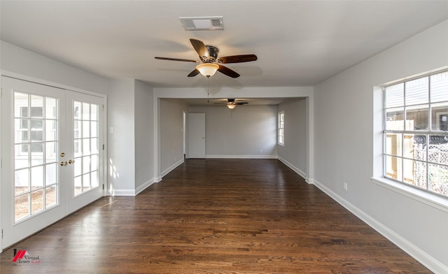 unfurnished room featuring dark wood-type flooring, french doors, and ceiling fan