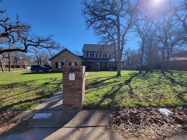 exterior space featuring a front lawn