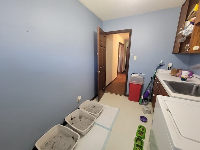 laundry area with washer / clothes dryer and sink