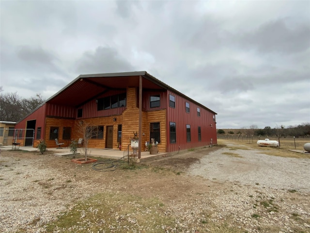 back of property with a patio area