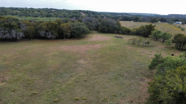 birds eye view of property featuring a rural view