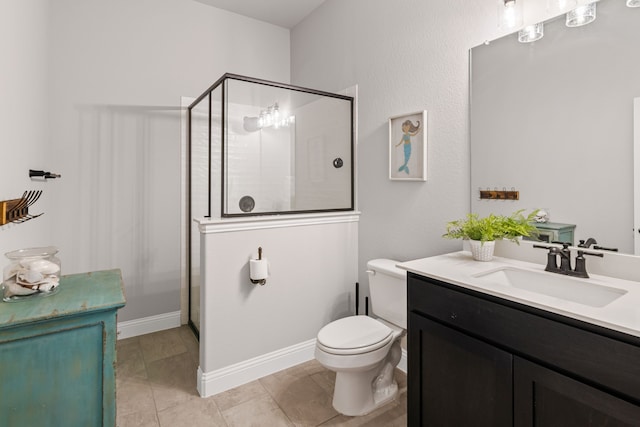 full bath with toilet, a shower stall, vanity, and baseboards