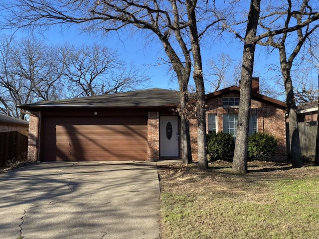 ranch-style house featuring a garage