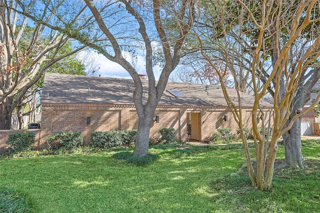 view of front of home with a front yard