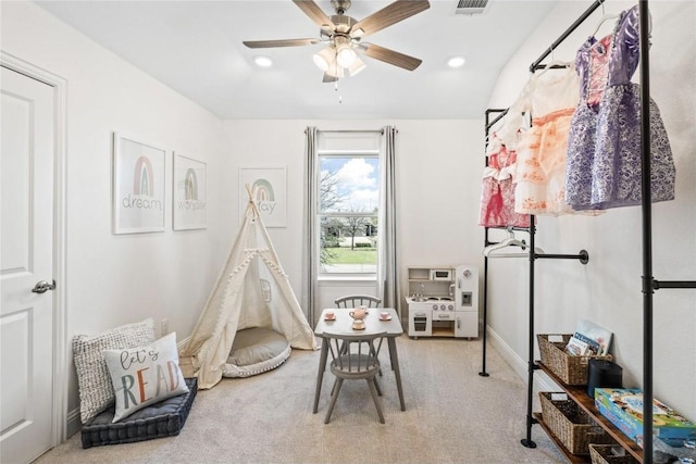 rec room featuring carpet floors and ceiling fan