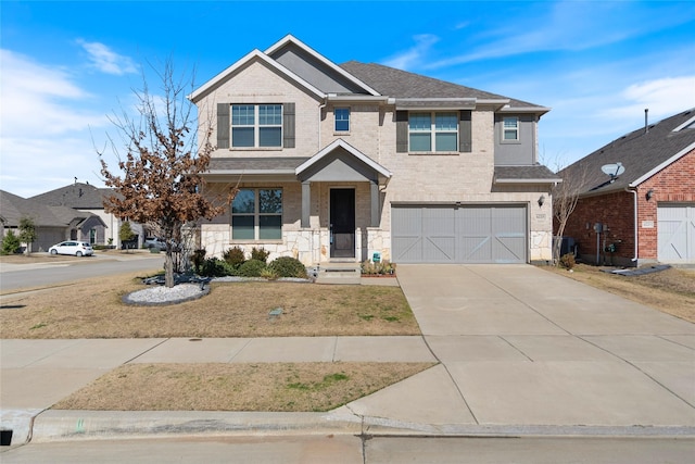 view of front of property featuring a garage