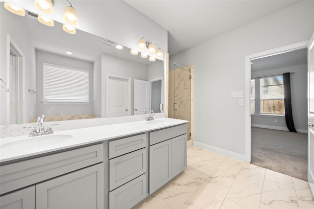 6225 Kent Ln, Celina, TX 76227 - full bath featuring marble finish floors, a shower stall, double vanity, and baseboards