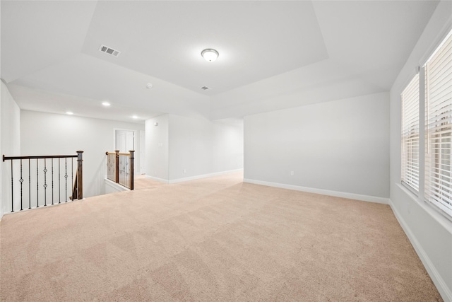 6225 Kent Ln, Celina, TX 76227 - spare room with light colored carpet, recessed lighting, baseboards, and a tray ceiling